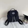 Mochila negra minimalista con cordón de nailon para la universidad y viajes fuera - Negro