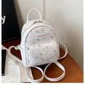 Floral mini backpack in white with pink blossoms and pleated texture for women - No Pendant / White