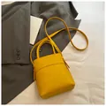 Chic bright yellow mini bucket bag with fashion lettering and adjustable shoulder strap - Yellow Without Pendant