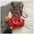 Red crocodile pattern shell-shaped handbag with plush bear charm and crossbody strap - With Charm / Red