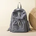 Sac à dos en nylon gris minimaliste pour femme avec bretelles réglables et cordon de serrage - Gris