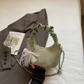 Elegant light green woven crescent bag with pearl lace charm and leather chain strap - Green with Charm