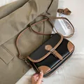 Minimalist black lychee texture square bag with brown trim and silver buckle strap - Black