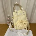 Light yellow crossbody bag with decorative bow and nylon strap for summer style - No Pendant / Yellow