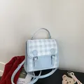 Mini light blue checkered backpack for women with metal buckles and crossbody strap - Blue Without Charm