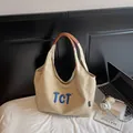 Bolso tote de lona beige con asas de cuero marrón y bordado azul TCT decorativo - Gris Beige