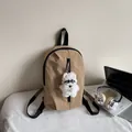 Khaki nylon casual backpack with cute plush dog pendant and black webbing straps - With Charm / Khaki