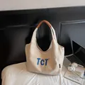 Bolso tote hobo de lona color crema con bordado TCT azul y asas de cuero marrón chic - Caqui