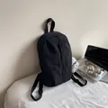 Zaino minimalista in nylon nero in stile street con tasca con cerniera verticale - senza ciondolo / Nero