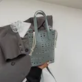 Secchiello azzurro tagliato al laser con motivo geometrico traforato e sacchetto interno - Blu