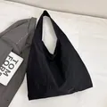 Minimalist black large capacity canvas tote bag with wide shoulder strap in nylon - Black