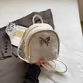 Mini zaino a farfalla bianco sporco con pannello glitter argento e decorazione a farfalla - Bianco Sporco