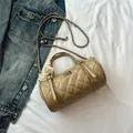 Quilted barrel crossbody bag in khaki faux leather with lace bow and gold chain strap - Khaki