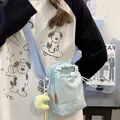 Lichtblauwe casual crossbodytas in Koreaanse stijl met trekkoord en borduursel - Blauw met Hanger