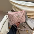 Pink quilted shoulder bag with silver star emblem and chain strap in a stylish setup - Pink (With Pendant)