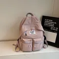 Minimalist dusty pink nylon backpack with multi-pocket design and adjustable straps - No Pendant / Purple