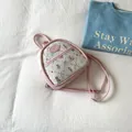 Mini-Rucksack in Rosa und Weiß mit gestepptem Blumen-Bären-Muster und Trageriemen - Rosa
