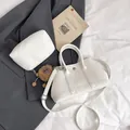 White lychee pattern leather shoulder bag set with a cute plush monkey keychain - With Pendant / White