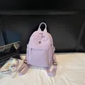 Sac à dos en nylon lavande minimaliste avec plusieurs poches et bretelles réglables - Violet