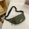 Minimalist deep green waterproof chest bag with adjustable strap and logo detail - Green
