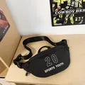 Black sports waist bag with 20 Sports Youth print and adjustable strap on a wood surface - Black