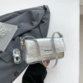 Silver crocodile-patterned rectangular shoulder bag with adjustable strap and metallic finish - Silver