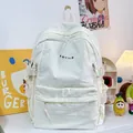 Creamy white nylon backpack with KBYILD embroidery and multi-pocket storage design - White Without Pendant