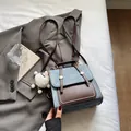 Retro grey-blue denim and brown leather multifunctional backpack with gold stud detail - Blue with Charm