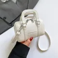 White lychee leather mini Boston bag with fashion print and adjustable strap - White