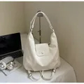 Cream white convertible leather backpack and tote bag with glossy finish for daily commute - Off-White (Without Pendant)