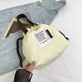 Bolsa térmica porta comida en blanco crema con asas marrones y cierre de cordón - Beige