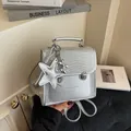 Silver sequin backpack for women with star charm and metallic balloon dog pendant - Water Ripple Pattern With Pendant