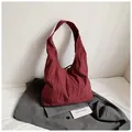 Grande borsa tote a quadretti rossi con chiusura a fiocco e tessuto testurizzato - Rosso
