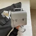 Silver metallic fashion backpack featuring woven texture top flap and metal buckles - Rhinestone Pattern Without Pendant