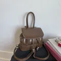 Vintage dark brown leather backpack with embossed lettering and silver hardware - Coffee without Pendant