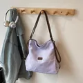 Light purple canvas tote bag with dark brown leather straps and brand logo detail - No Pendant / Purple