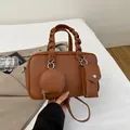 Caramel brown Boston bag set with woven handles and detachable pouches in textured leather - Brown