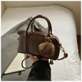 Vintage dark brown Boston bag in glossy leather with plush charm and shoulder strap - With Charm / Brown