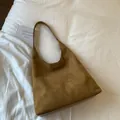 Brown suede hobo shoulder bag with large capacity and minimalist design - Brown