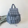 Mist blue quilted bubble backpack for women with drawstring and front zipper pocket - Blue