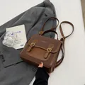 Stylish vintage brown faux leather backpack with decorative gold buckle straps for women - No Pendant / Coffee