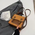 Retro brown and ginger yellow leather backpack with dual buckles and adjustable straps - No Pendant / Orange