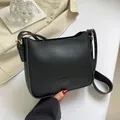 Minimalist black square shoulder bag in smooth synthetic leather with gold hardware - Black