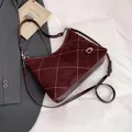 Deep wine red quilted suede underarm bag with double straps and metal hardware detail - Burgundy
