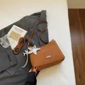 Brown matte suede shoulder bag with star charm and adjustable strap for women - With Pendant / Brown