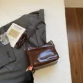 Minimalist dark brown matte faux leather underarm bag with adjustable shoulder strap - No Pendant / Coffee
