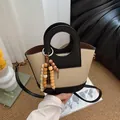 Vintage canvas bucket bag met contrastkleur en rond uitgesneden handvat voor dames - Crème Wit met Hanger