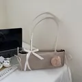 Beige matte shoulder bag with checkered bow, fur ball charm, and zipper closure - Beige With Pendant