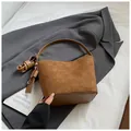 Brown vintage suede bucket bag with leather patchwork and adjustable strap - Brown