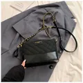 Chic black quilted bucket bag with gold chain strap and stylish mixed material design - No Pendant / Black
